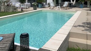 A modern two-story house with a swimming pool, outdoor seating, and a hammock. - ANGLET, 8 pers COAST HOUSE WITH SWIMMING POOL, NEAR THE BEACH, cycle path, GOLF (Anglet)