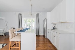 Fridge, microwave, paper towels, kitchen islands