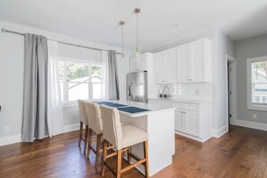 Fridge, microwave, paper towels, kitchen islands