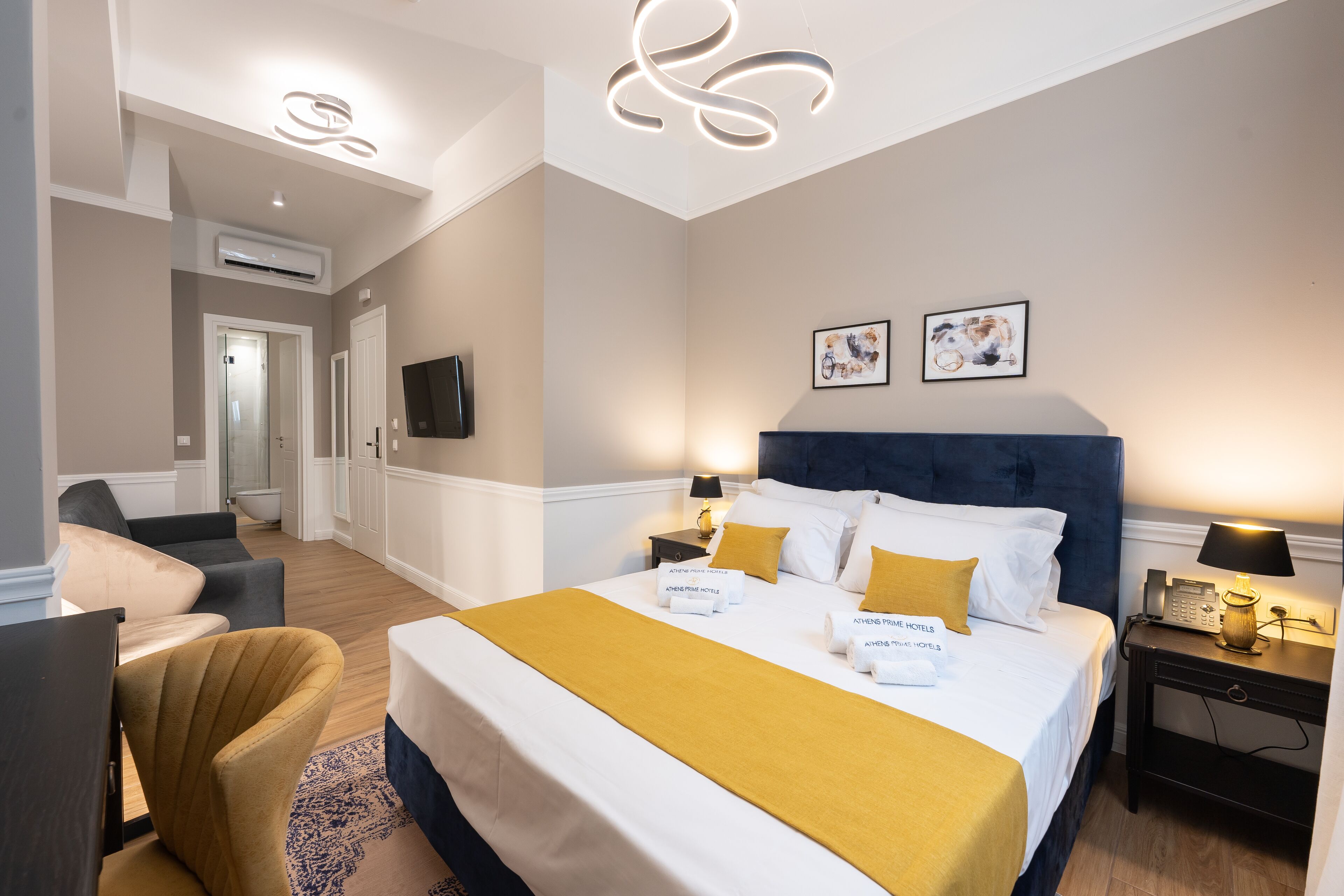 junior suite | in-room safe, desk, soundproofing, iron/ironing board