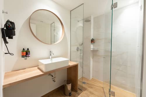 Standard Double Room, Ground Floor | Bathroom | Shower, hair dryer, towels