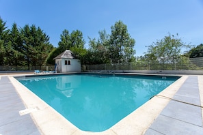 Seasonal outdoor pool, pool loungers