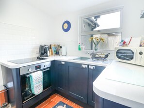 Fridge, electric kettle, toaster, cookware/dishes/utensils