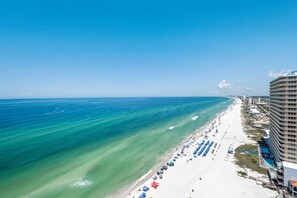 Enjoy a beachfront stay with access to a long, sandy beach and lounge chairs.