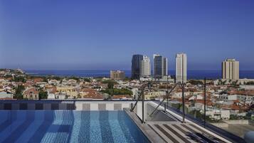 Seasonal outdoor pool, open 10:00 AM to 5:00 PM, free cabanas
