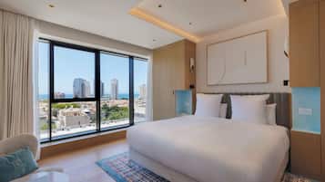 Quarto executivo, 1 cama King, vista para o mar | Frigobar (abastecido com itens grátis), cofres nos quartos