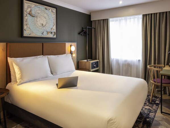 Desk, laptop workspace, free WiFi, bed sheets