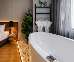 Royal Room | Premium bedding, in-room safe, blackout drapes, free WiFi
