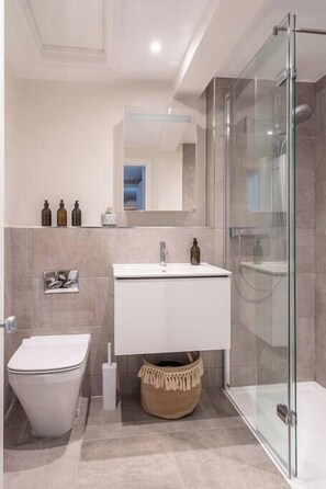 Bathtub, hair dryer, towels