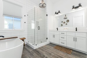 Bathtub, hair dryer, towels