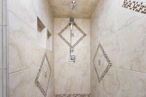 Combined shower/bathtub, hair dryer, towels, soap