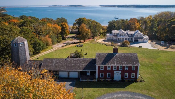 A large estate with a main house, a tower, and a view of the sea. - Private Beach - 3 bedroom (Orleans)