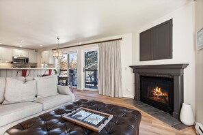 Woodbridge Condo 27A | Living area | 40-inch flat-screen TV with cable channels, TV - Woodbridge Condos by Snowmass Vacations (Snowmass Village)