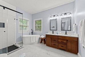 Combined shower/tub, hair dryer, towels, soap