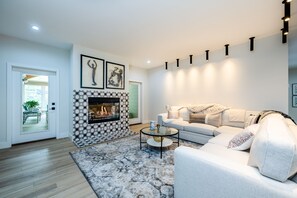 TV, fireplace - (2026 OPEN!) Gorgeous Grand Beach Home With Private Pool! (MI)