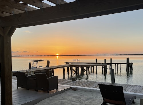 Unique, authentic, exquisite waterfront cottage with a dock.