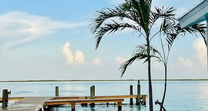 Unique, authentic, exquisite waterfront cottage with a dock.