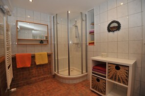 Shower, hair dryer, towels, soap