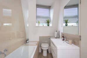 Bathtub, hair dryer