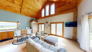 Una Smart TV, una chimenea, un reproductor estéreo