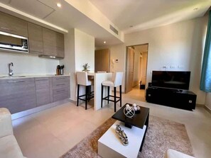 TV - Apartment with pools, golf and beach club! (Playa del Carmen)