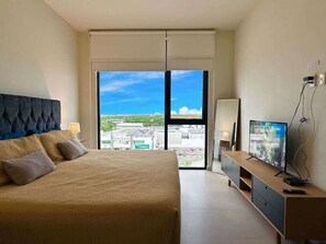 1 dormitorio, tabla de planchar con plancha, wifi y ropa de cama