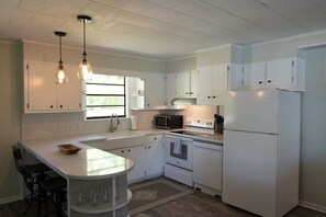 Fridge, microwave, oven, stovetop - Hot Tub! Lakefront Home - Fire Pit, Kayaks, & Two-Story Dock (Jasper)