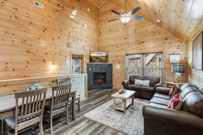 TV, fireplace, video games - The "Red Bird Cabin" is a newly built 2 bed/2 bath cabin less than a mile from Pigeon Forge. (Pigeon Forge)