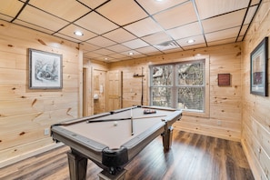 Game room - The "Red Bird Cabin" is a newly built 2 bed/2 bath cabin less than a mile from Pigeon Forge. (Pigeon Forge)