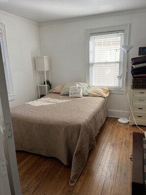 1 bedroom, desk, iron/ironing board, travel crib