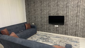 Deluxe Apartment | Living area