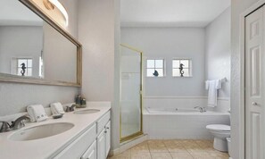 Bathtub, hair dryer, towels, soap