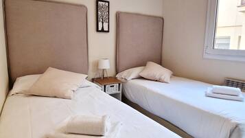 4 dormitorios, tabla de planchar con plancha, wifi y ropa de cama