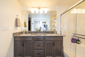 Combined shower/bathtub, hair dryer, towels, soap