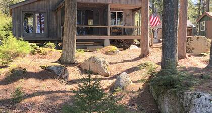 Cozy, Off-Grid Camp on Spectacle Pond w/ private water frontage!