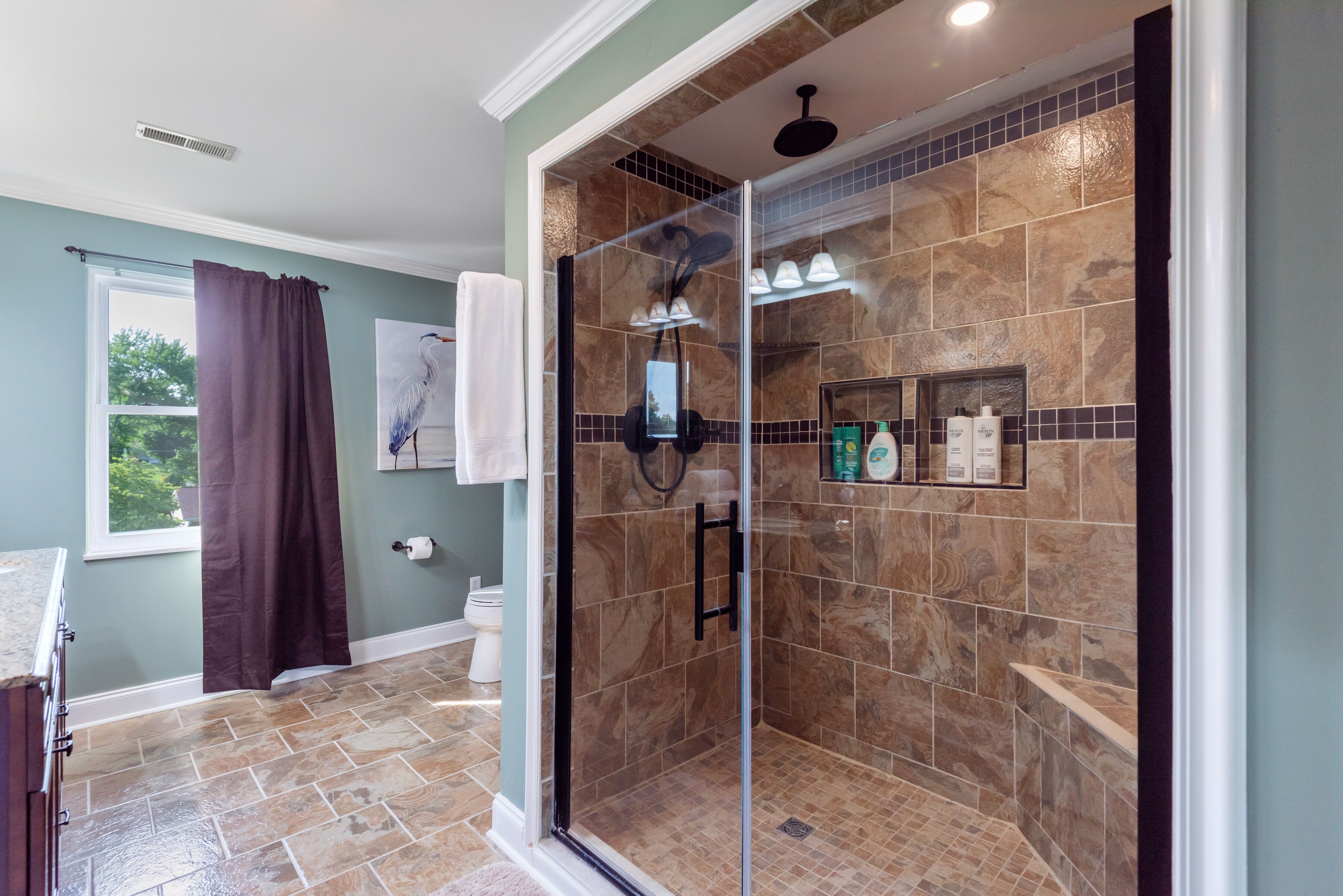 Combined shower/tub, hair dryer, towels, soap