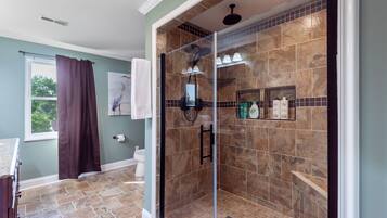 Combined shower/tub, hair dryer, towels, soap