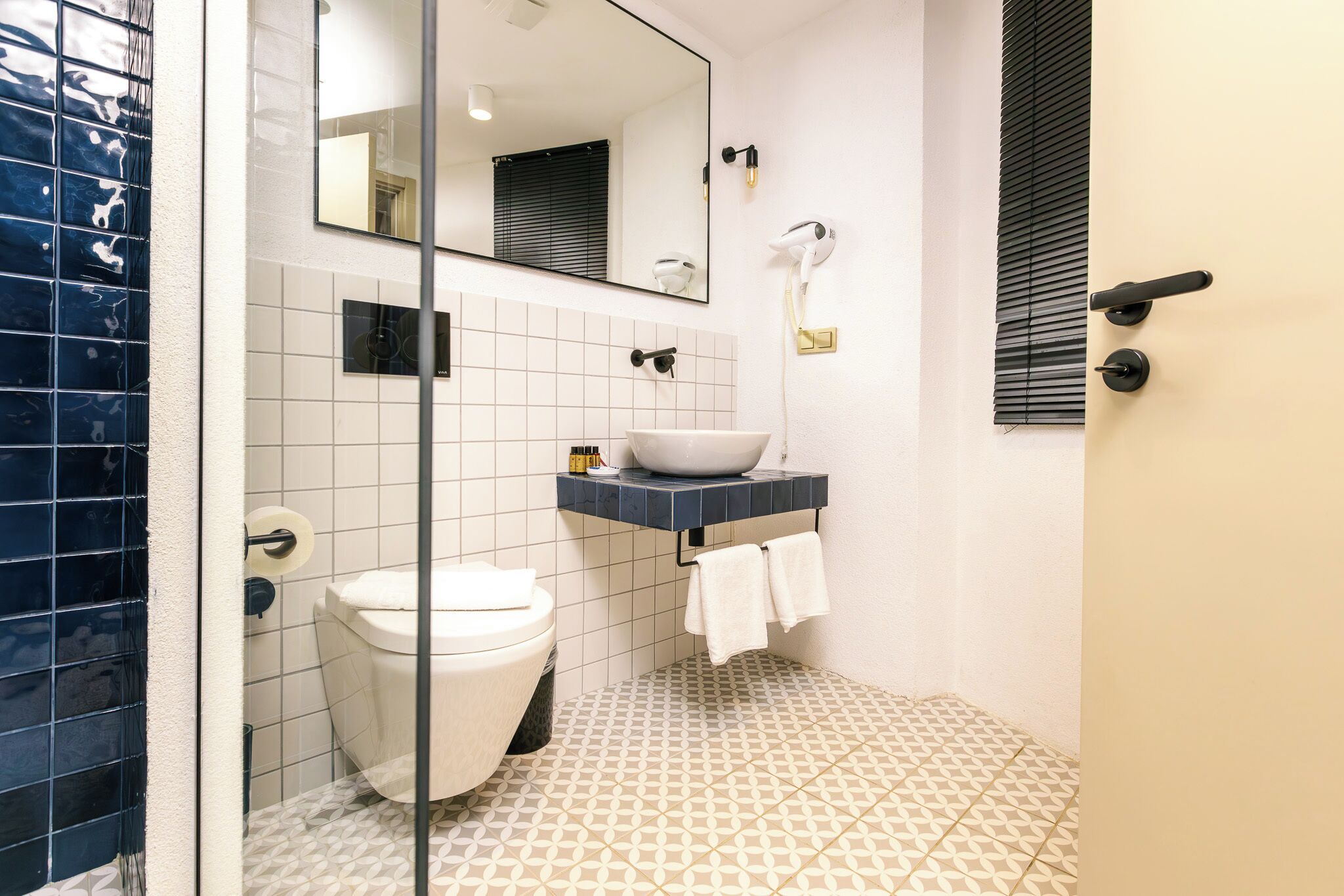 patio room - sea view | bathroom | designer toiletries, hair dryer, towels, soap