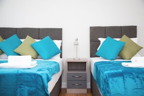 4 bedrooms, desk, iron/ironing board, travel cot