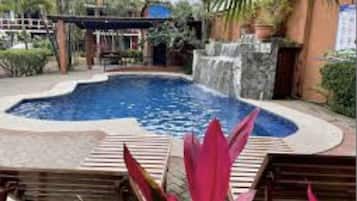 Outdoor pool, open 7:00 AM to 9:00 AM, free cabanas, pool umbrellas