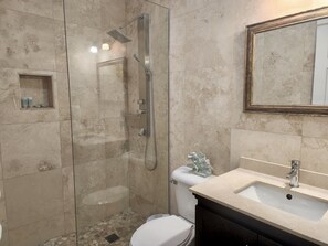 Bathtub, hair dryer, towels, soap