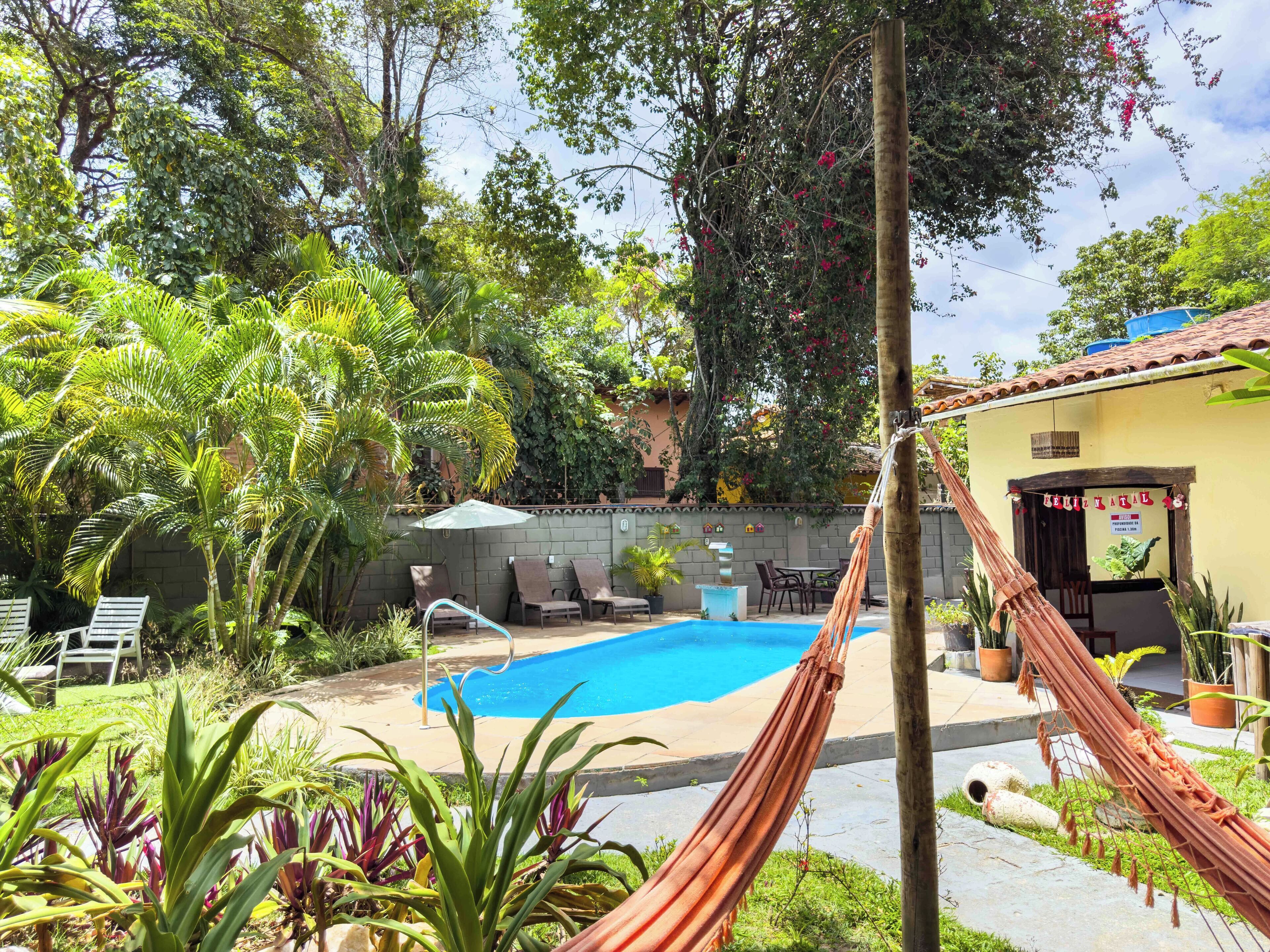 Outdoor pool, open 9:00 AM to 9:00 PM, pool loungers