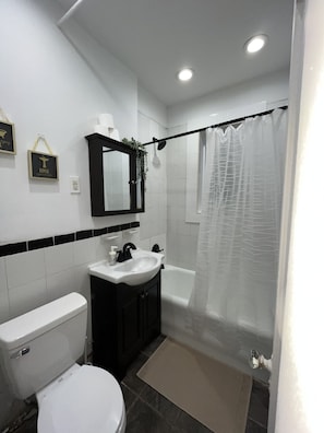 Hair dryer, towels, soap, shampoo