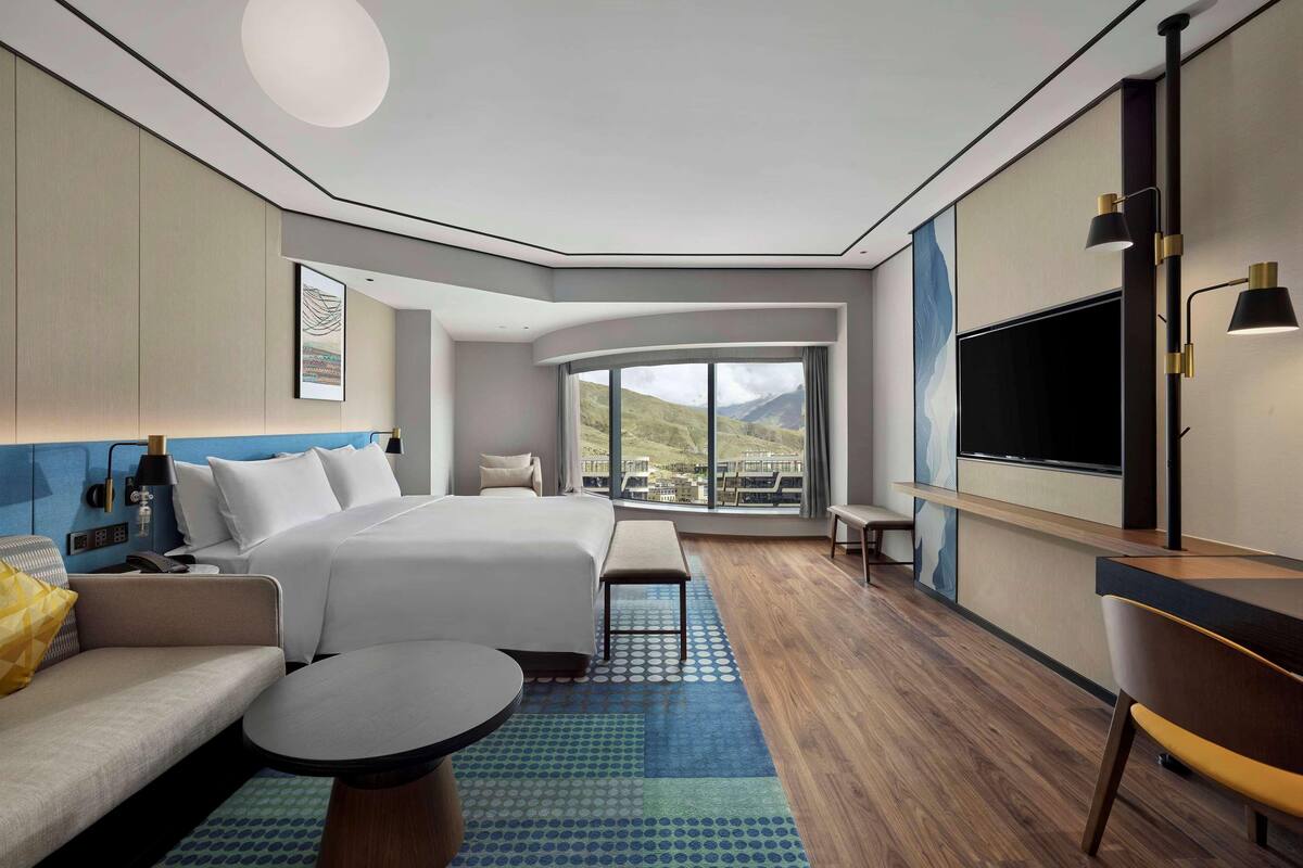 Premium bedding, down comforters, memory foam beds, in-room safe