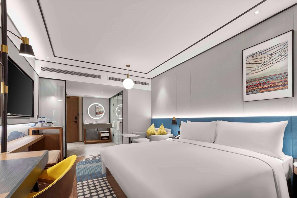 Premium bedding, down comforters, memory foam beds, in-room safe