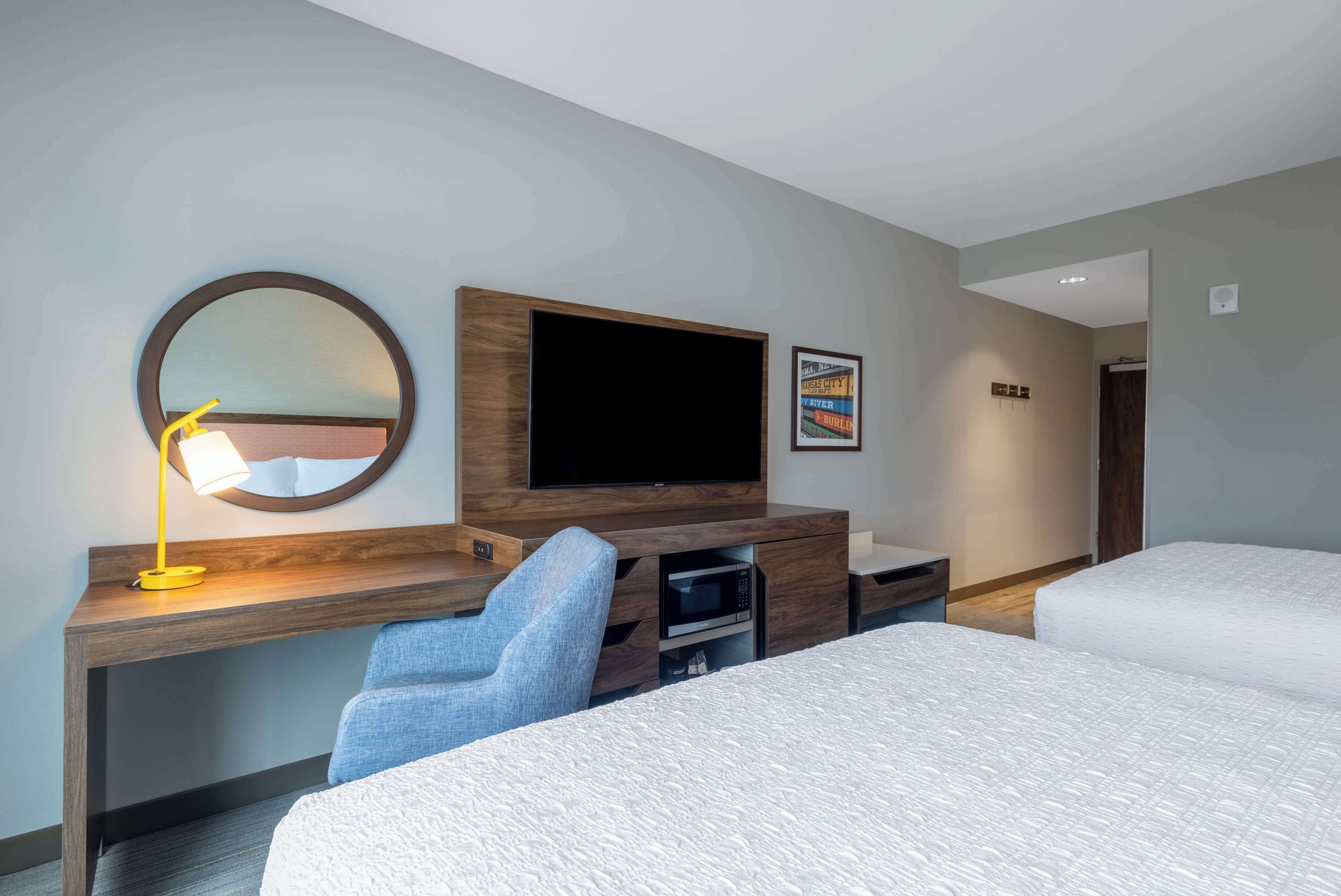 room, 2 queen beds, refrigerator | desk, blackout curtains, iron/ironing board, free cots/infant beds