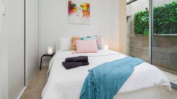 2 bedrooms, desk, iron/ironing board, travel cot