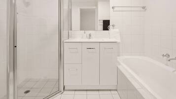 Bathtub, hair dryer, towels