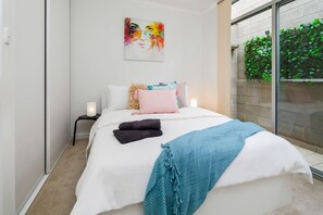 2 bedrooms, desk, iron/ironing board, travel cot