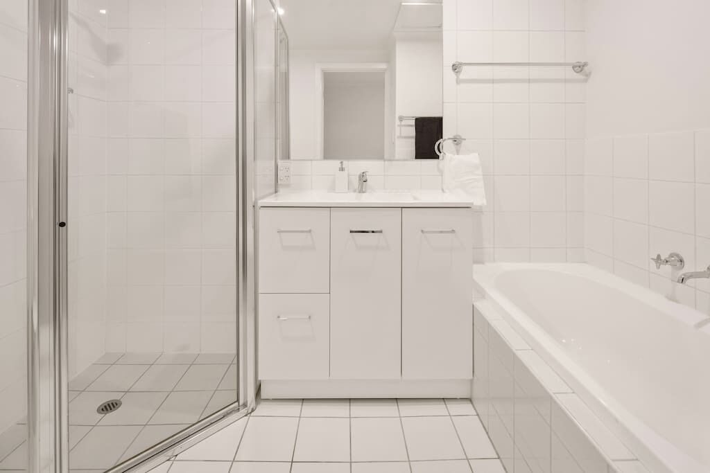 Bathtub, hair dryer, towels